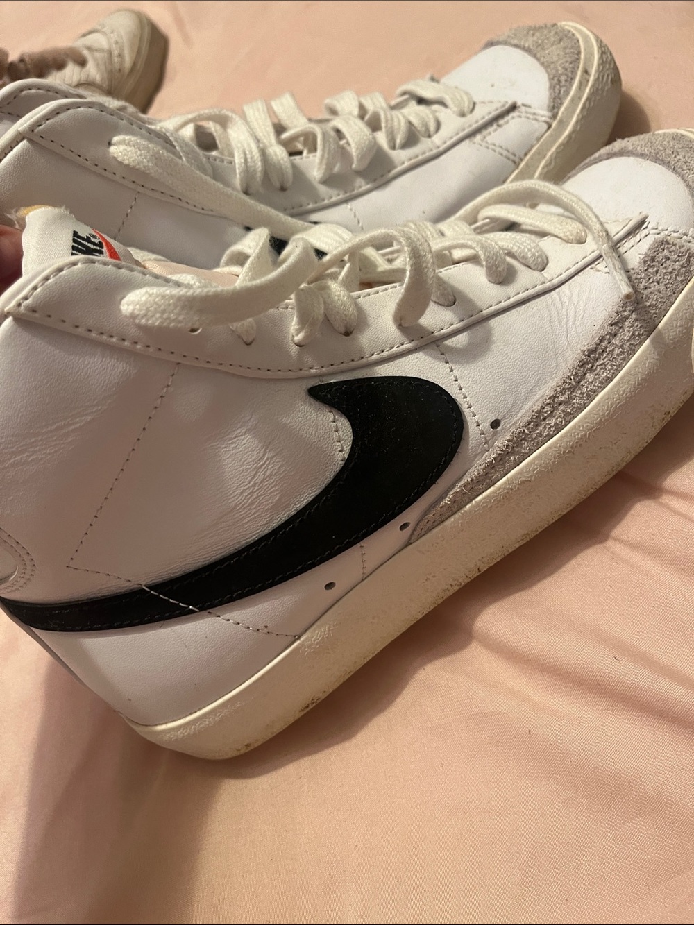 Nike White High-Top Sneakers with Black Swoosh and Gray Suede Trim
